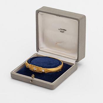 Oskar Lindroos, A 14K gold bracelet with diamond ca. 0.49 ct in total. Helsinki 1940s.