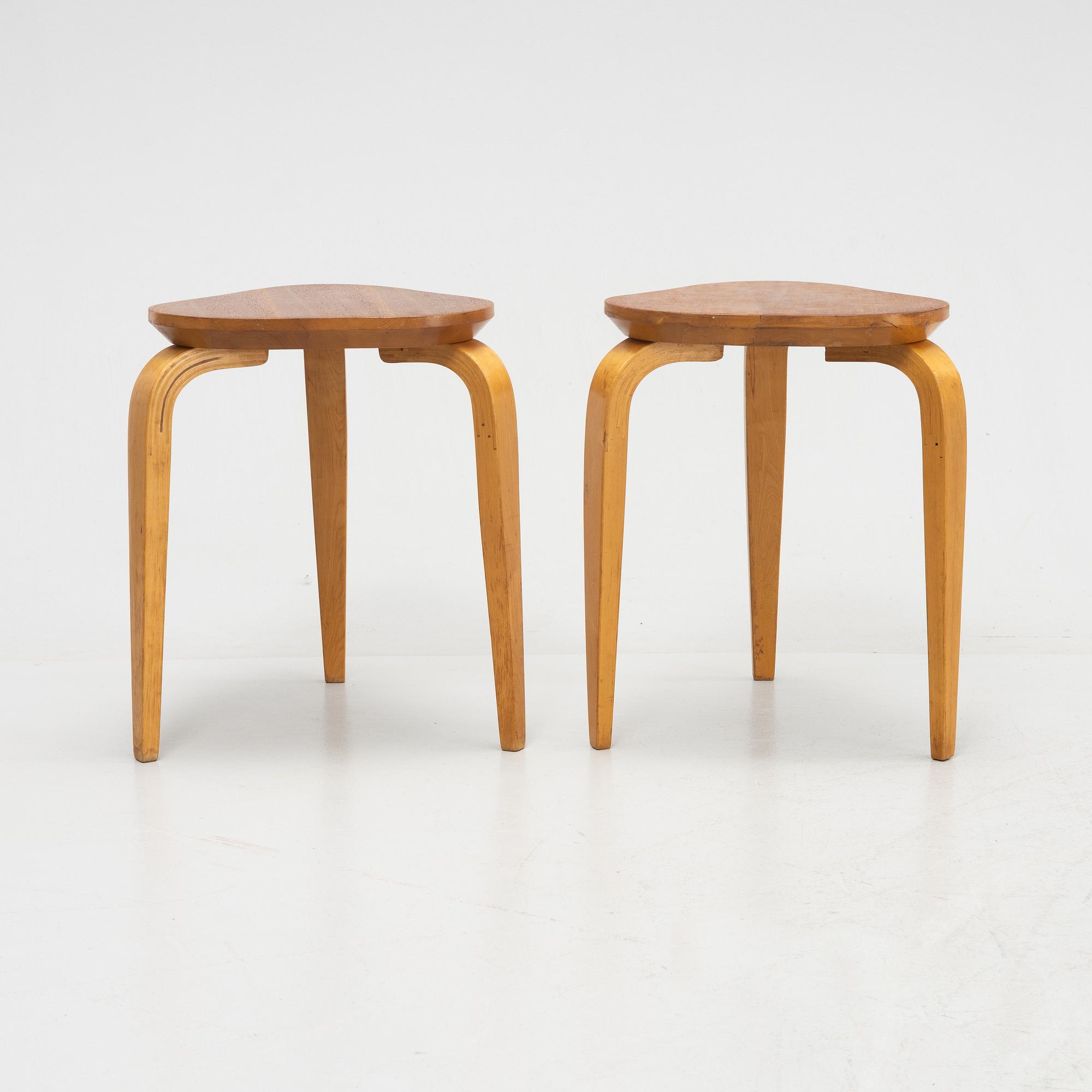 Gustav Axel Berg, a pair of Swedish Modern stools, mid 20th century.