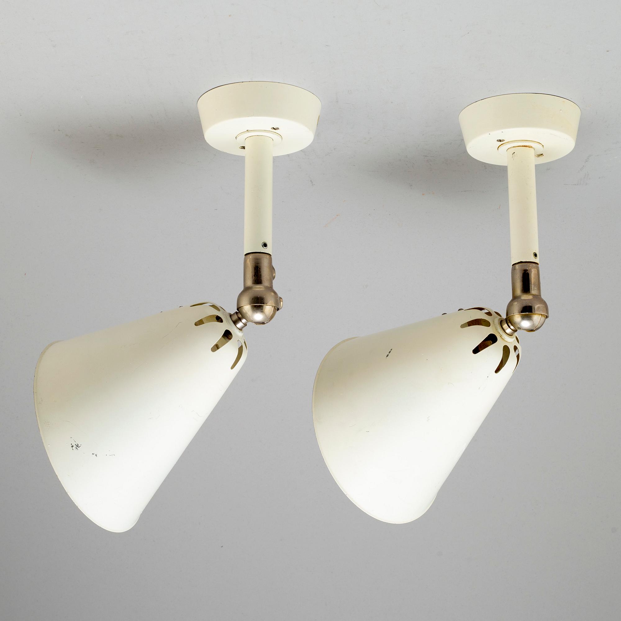 A pair of Asea wall lamps.