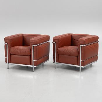 Le Corbusier, Pierre Jeanneret & Charlotte Perriand, a pair of "LC2" armchairs, Cassina, Italy.