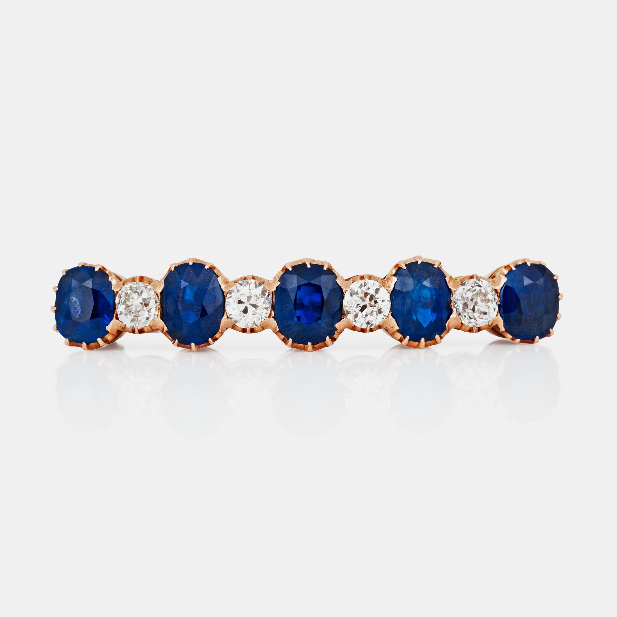 BROSCH med safirer totalt ca 8.50 ct samt gammalslipade diamanter totalt ca 1.60 ct. Ryska stämplar från S:t Petersburg.