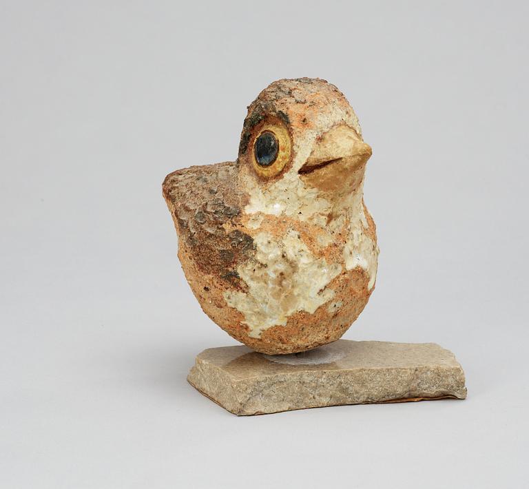 A Tyra Lundgren stoneware figure of a bird.