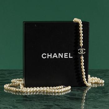 Necklace by Chanel.