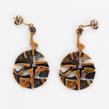 A pair of Jorma Laine earrings in bronze.