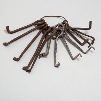 A set of 13 iron picklocks, 18th century.