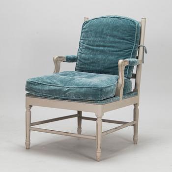 A Gustavian style armchair from the latter half of the 20th century.