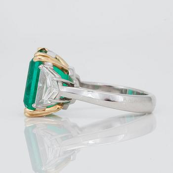 A 8.11ct emerald ring with diamonds.