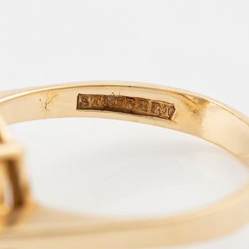 Ring in 18K gold with faceted smoky quartz, Stigbert.