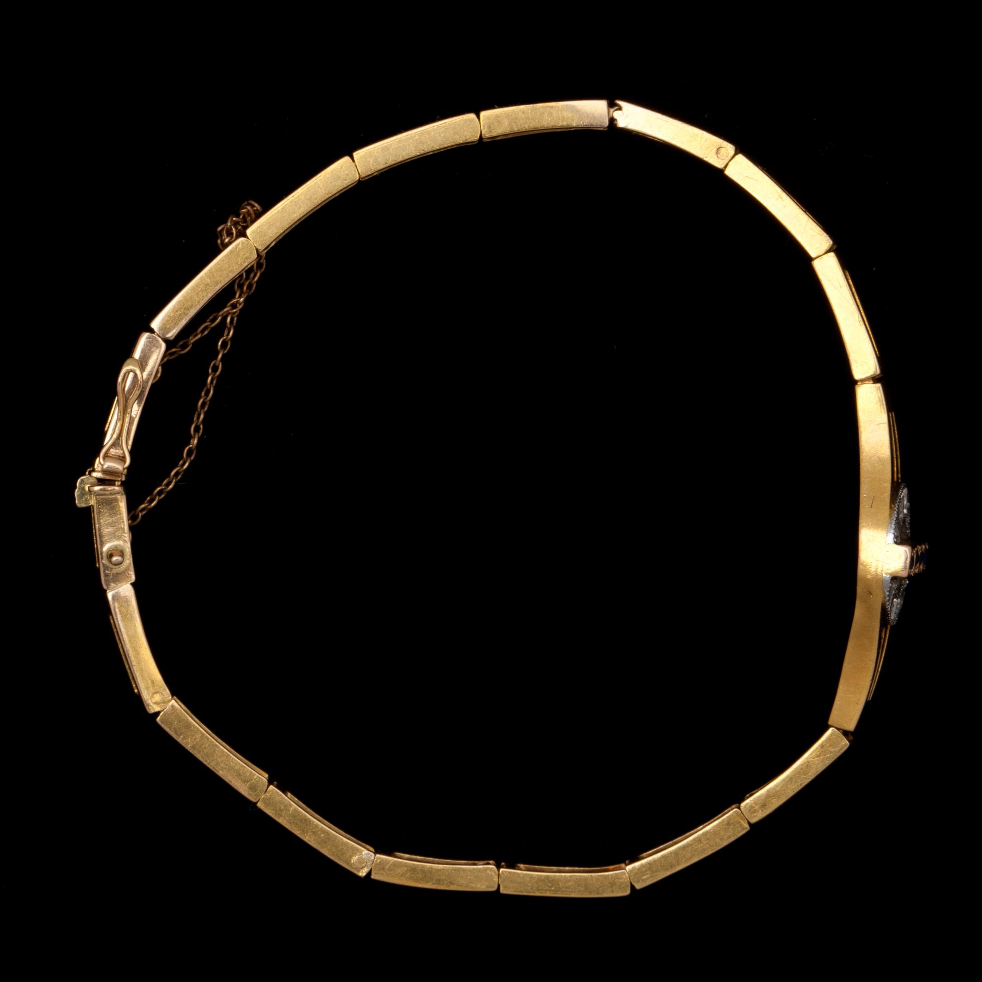 ARMBAND, 18k rödguld besatt med diamanter och safirer. Vikt 11 g.