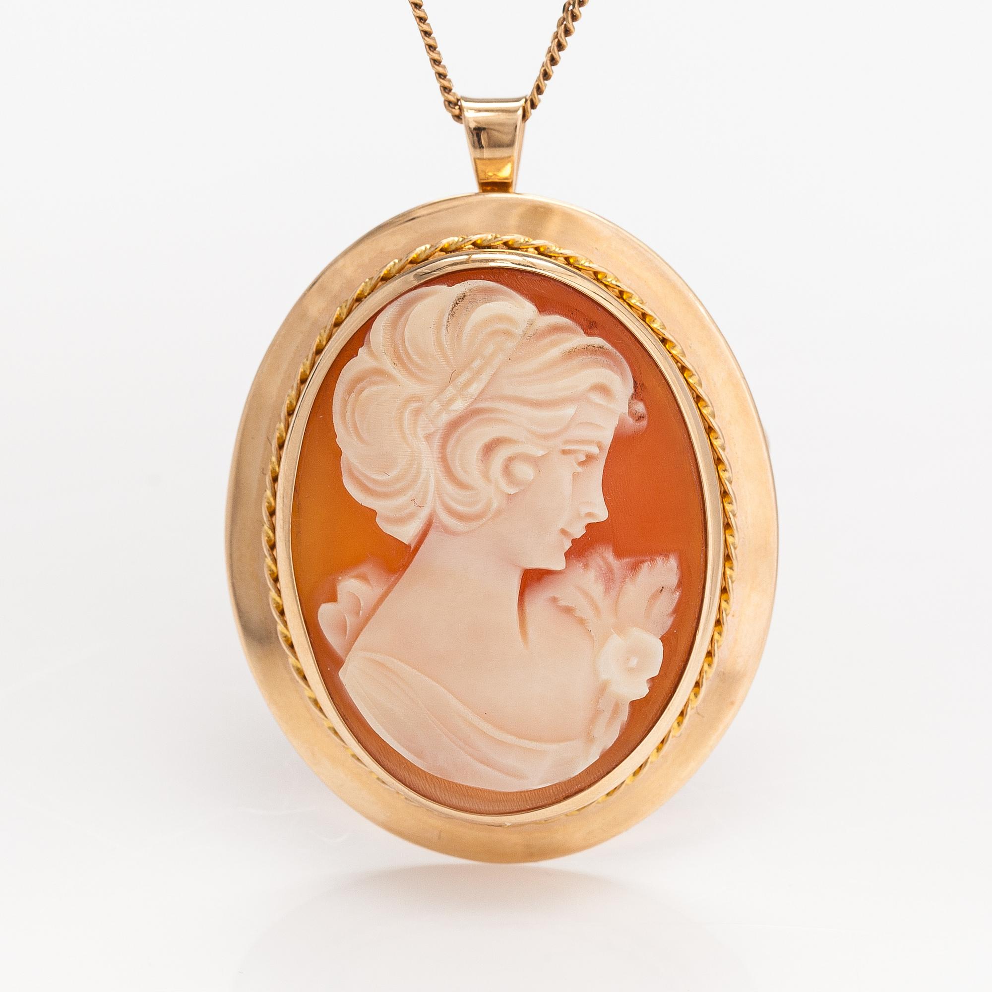 A 14K gold and sea shell came necklace/brooch. Kultakeskus, Hämeenlinna 1982.