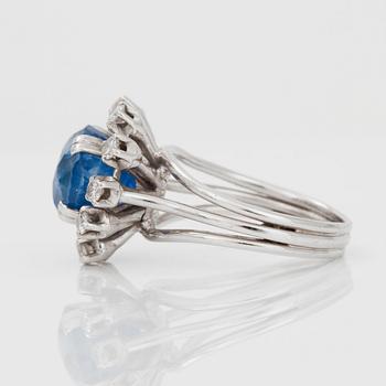 A sapphire and brilliant-cut diamond ring.