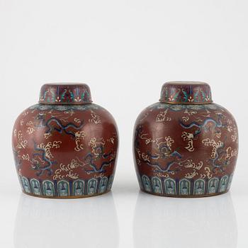 A pair of Chinese jars with covers, 20th Century.