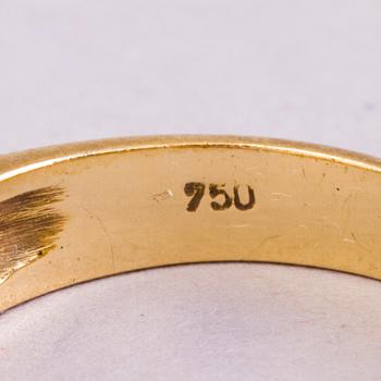 A 18K gold ring with 5 different stones: citrine, amethyst, topaz, garnet, peridot and a small diamond. Probably H.Stern.