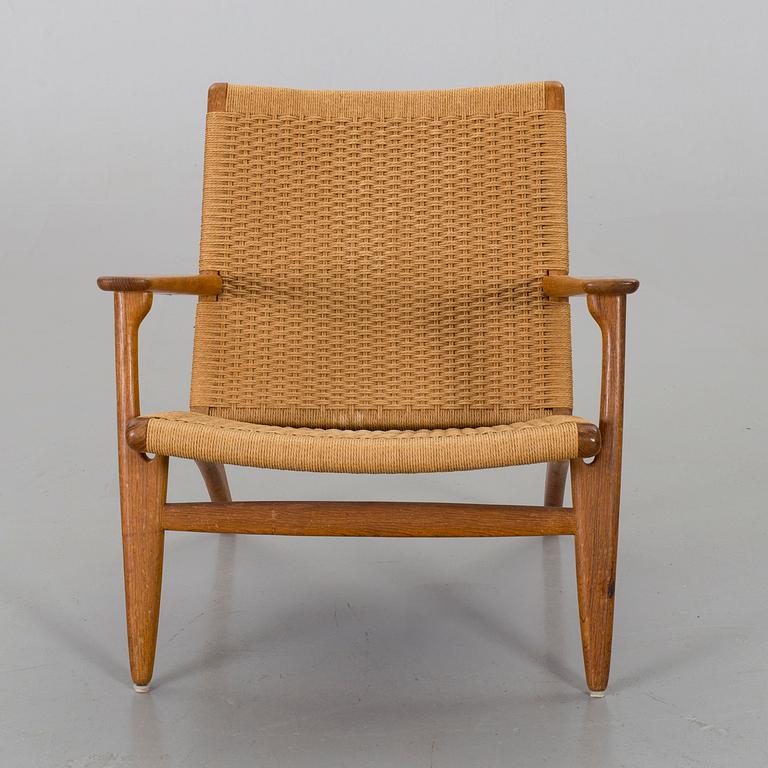 A HANS J WEGNER "CH 25" ARMCHAIR by Carl Hansen & Söner.