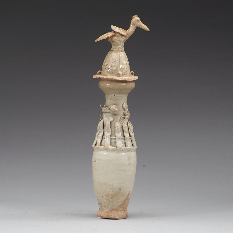 A funerary urn with cover, stoneware with qingbai glaze, Yuan dynasty (1279–1368).