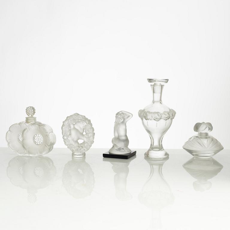Lalique, four perfume bottles and five figurines, France, after 1945.
