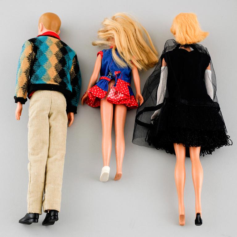 Three 1960s Barbie dolls with accessories, Mattel.