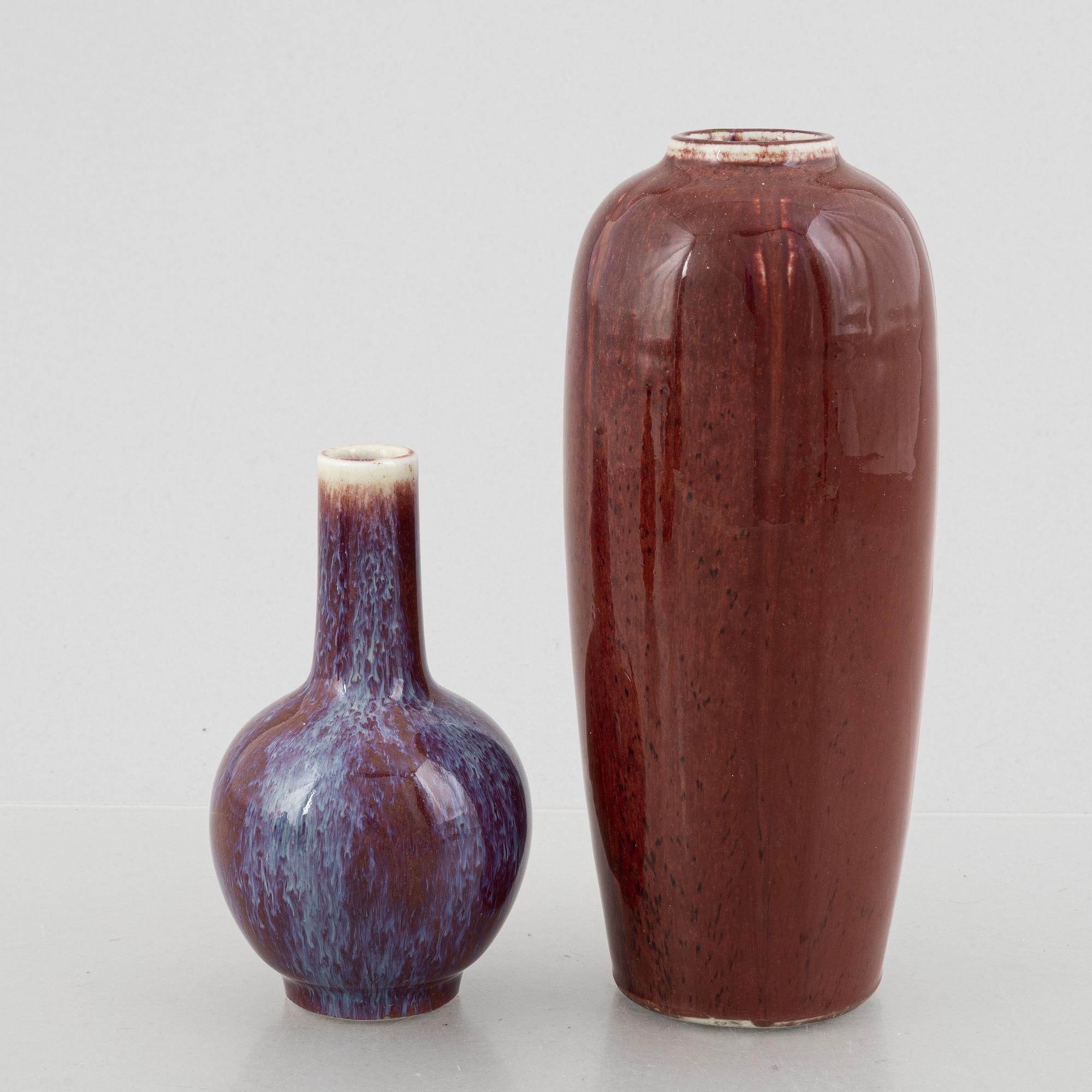 Four oxblood glazed porcelain vases, China, 20th century.