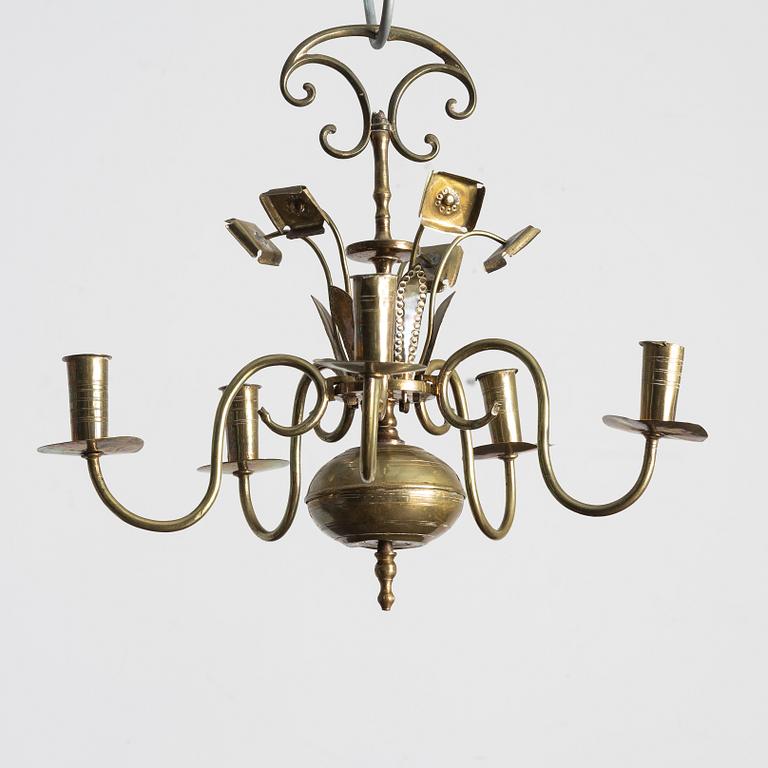 A Swedish five-branch brass chandelier, circa 1800.