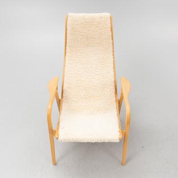 Yngve Ekström, a "Lamino" armchair with ottoman, Swedese, Sweden.