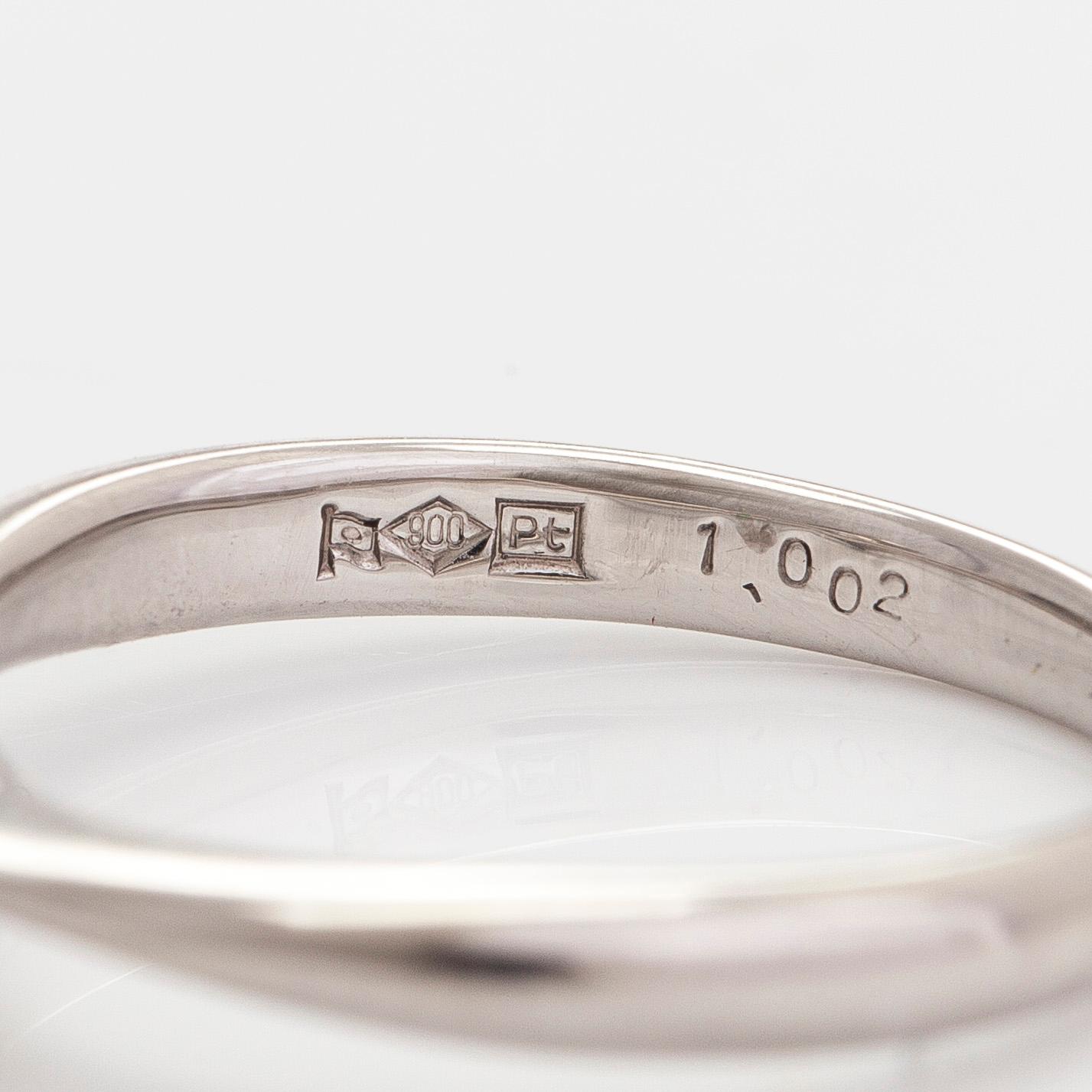 A platinum ring, with a brilliant-cut diamond approximately 1.00 ct according to the engraving.
