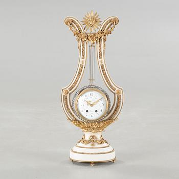 A table clock, dial marked "Gilles l'Ainé Paris", made around year 1900.