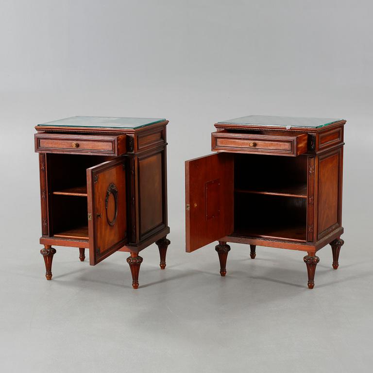 A pair of early 20th century bedside tables.