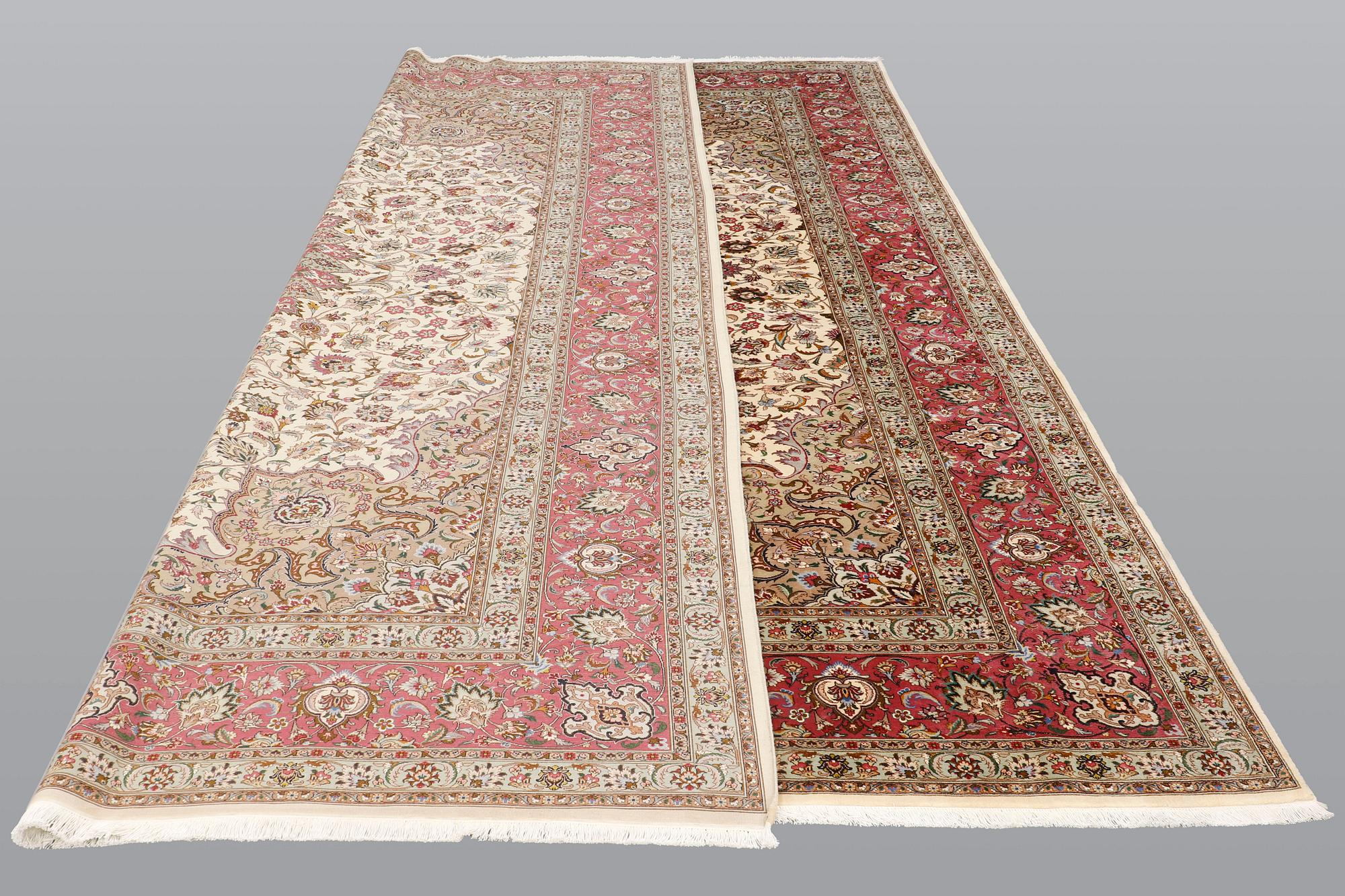 A carpet, Tabriz part silk, so called 50 Raj, cm 400 x 300 cm.