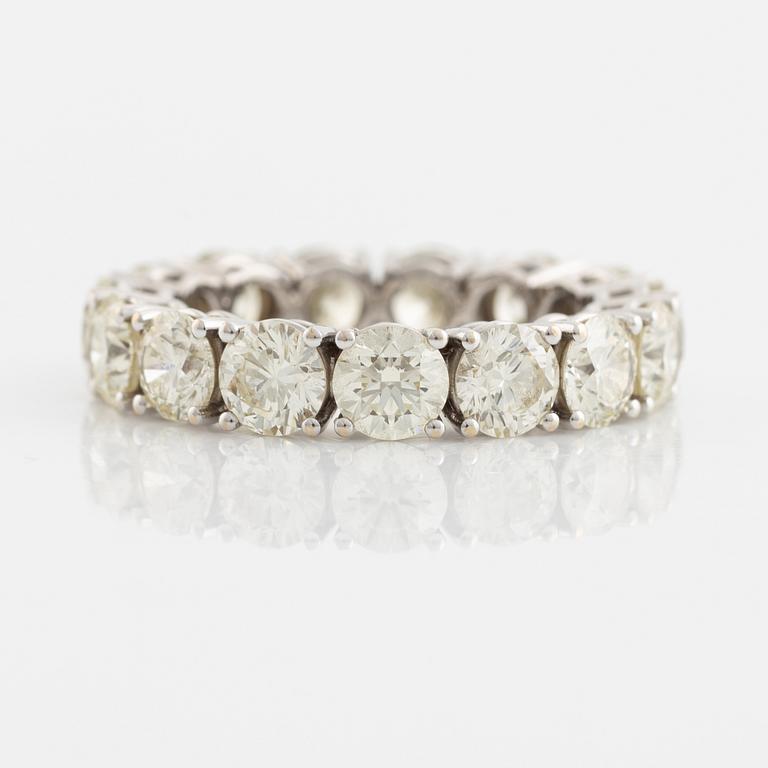 Brilliant cut diamond eternity ring.