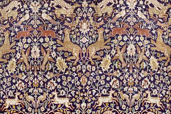 A carpet, figural silke Kashmir, ca 560 x 360 cm.
