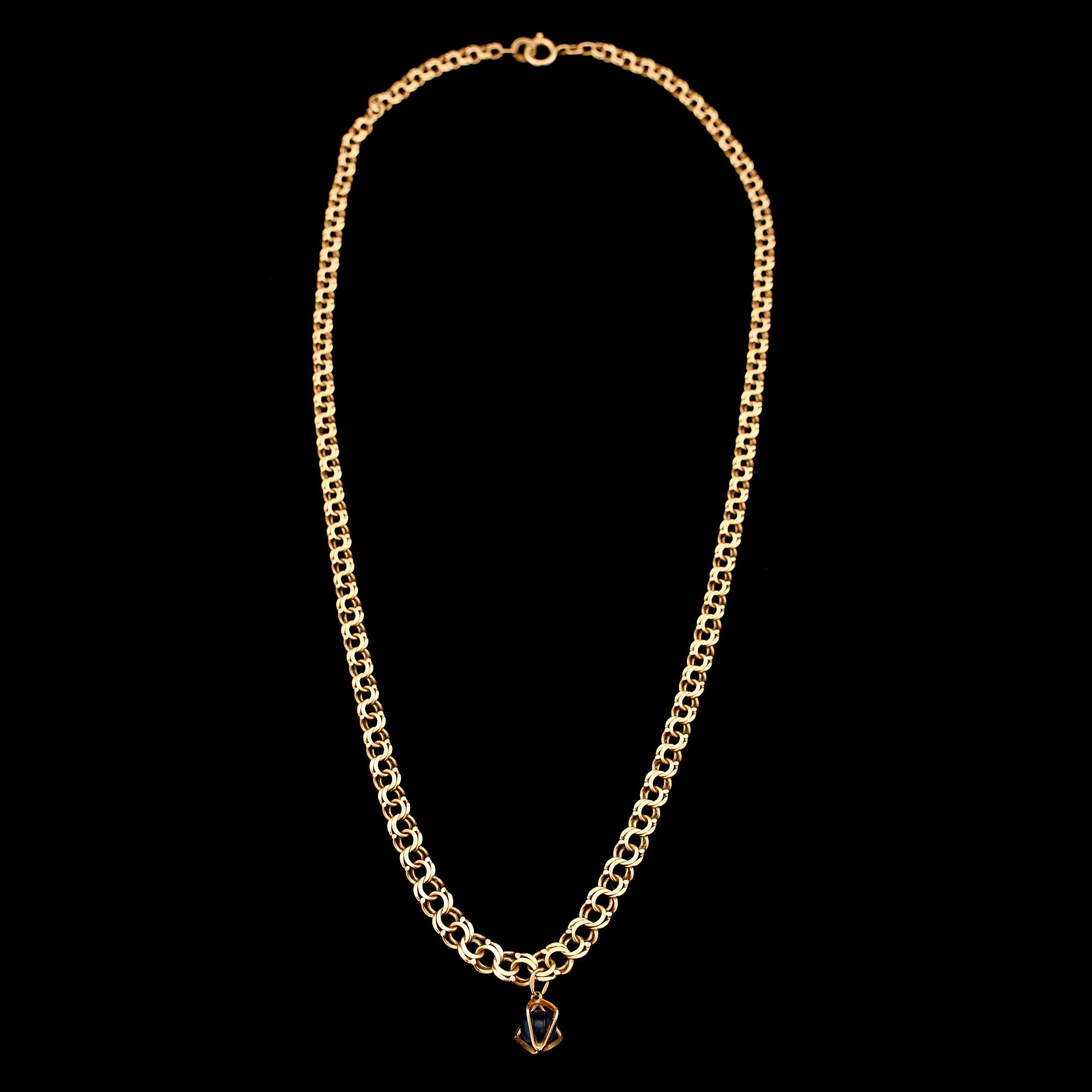 COLLIER MED HÄNGE, 18K guld, svenska stämplar, 1955. Total vikt ca 16 g.