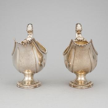 A PAIR OF SAUCE BOATS, silver, London1764. Weight 1017 grams.