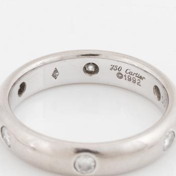 An 18K white gold Cartier ring set with round brilliant-cut diamonds.