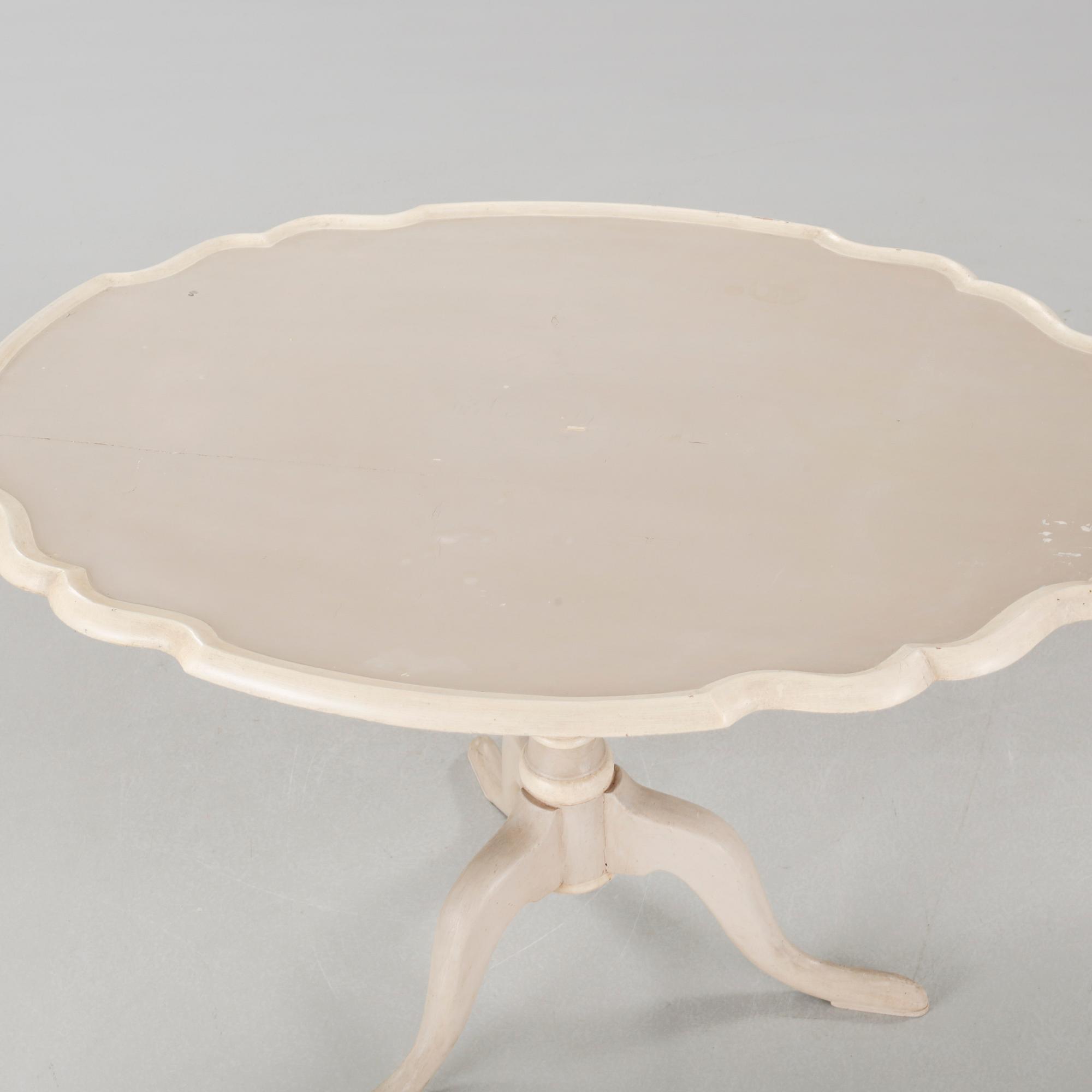 A late 19th century drop-leaf table.