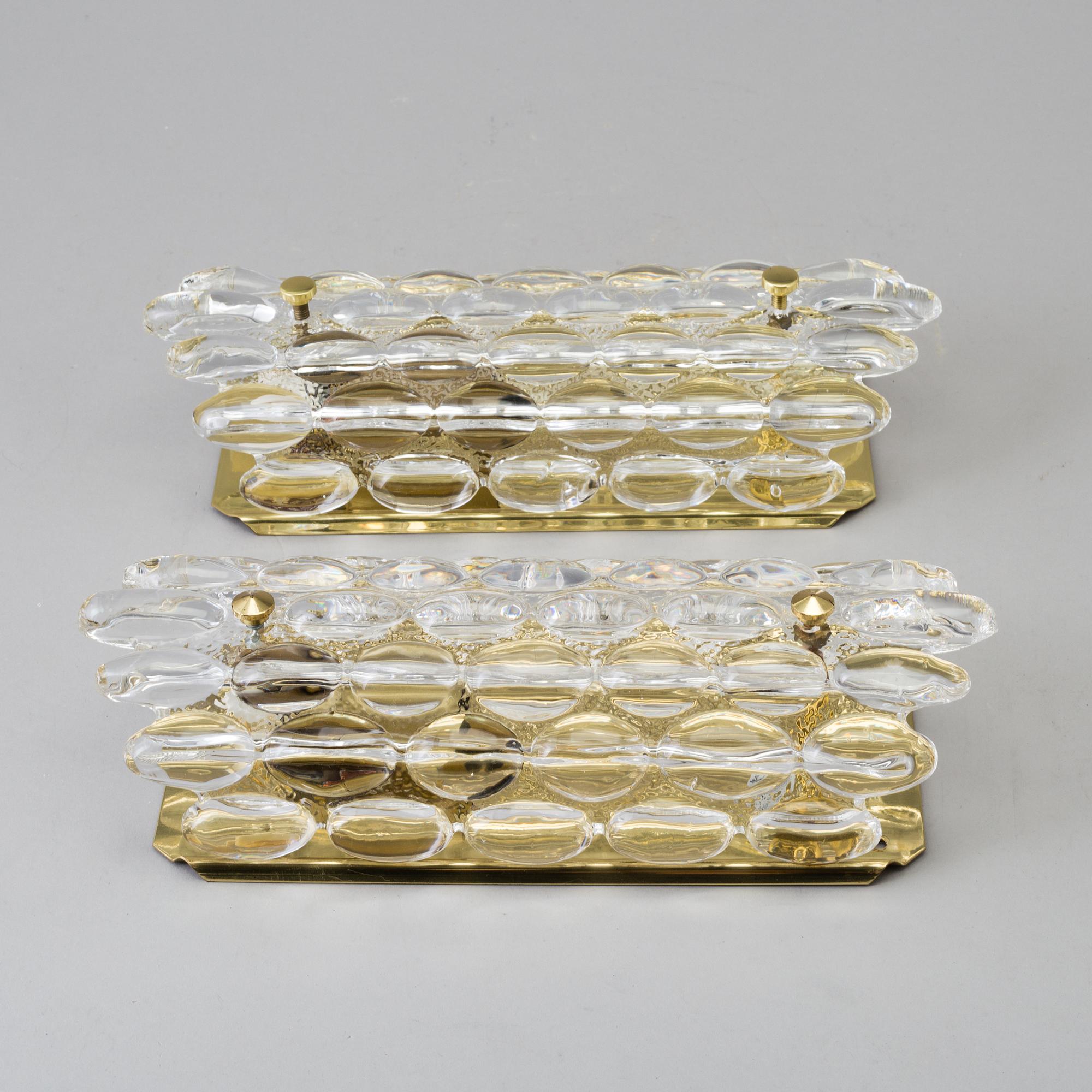 CARL FAGERLUND, a pair of glass wall lights, Orrefors, late 20th century.