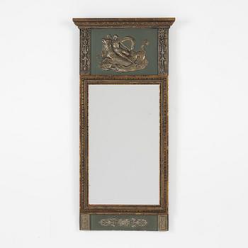 An Empire style mirror, first half of the 20th century.