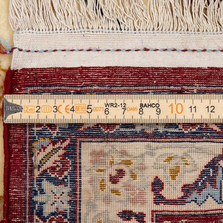 An Isfahan carpet, Central Persia, signed Akbaroff, c. 315 x 205 cm.