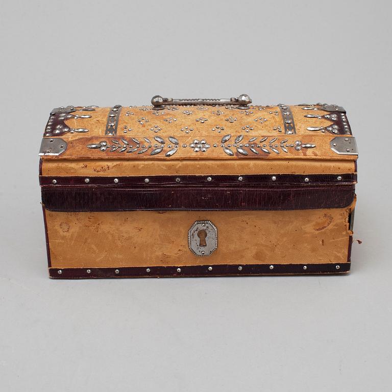 19th century leather box with steel decorations.