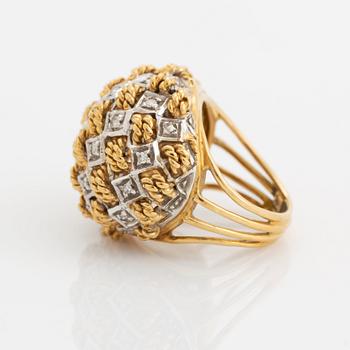 An 18K gold ring set with eight-cut diamonds.