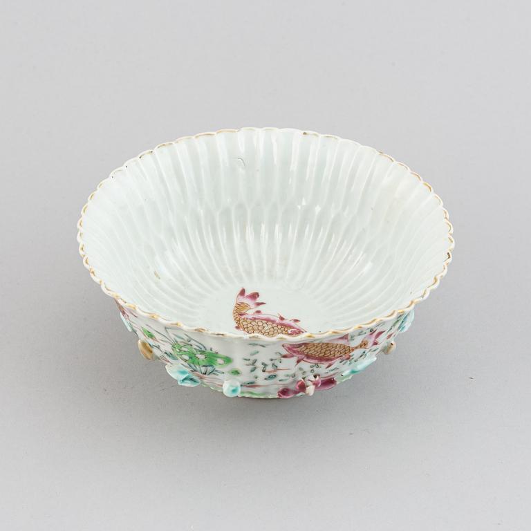 A famille rose relief moulded bowl, Qing dynasty, 18th century.