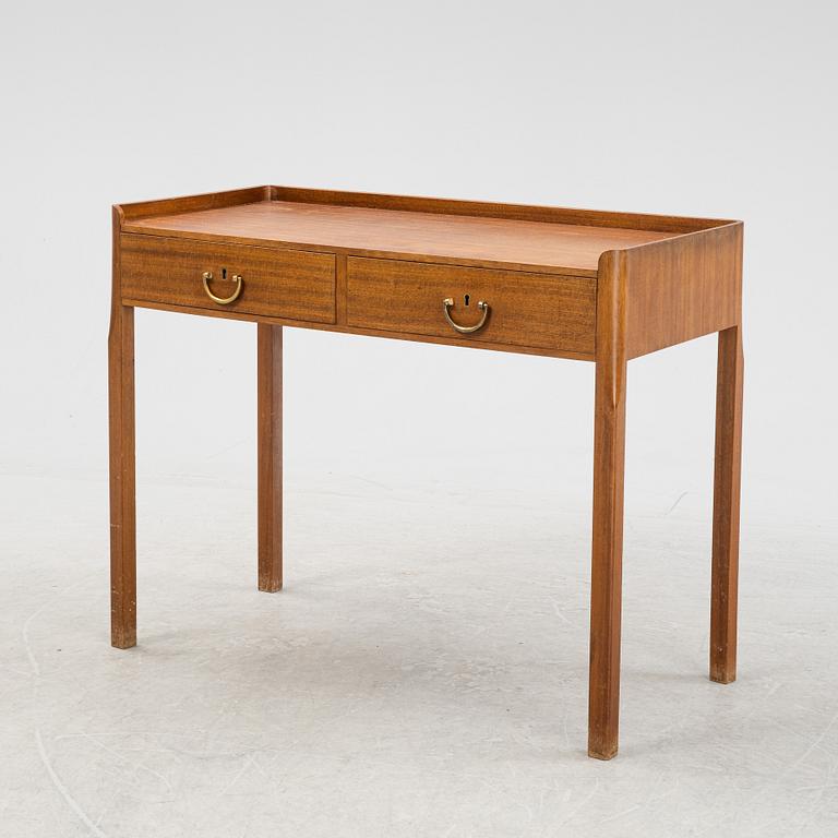 Josef Frank, attributed to, a mahogany veneered side table, Firma Svenskt Tenn, Sweden, mid 20th century.