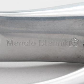 A metal shoe horn by Manolo Blahnik, 2000s.