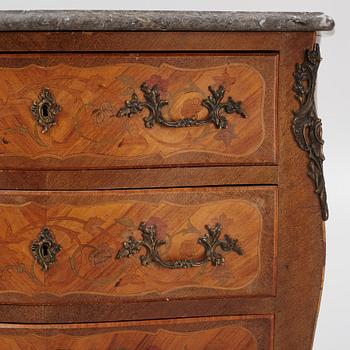 A Louis XV-style marquetry commode, first part of the 20th century.