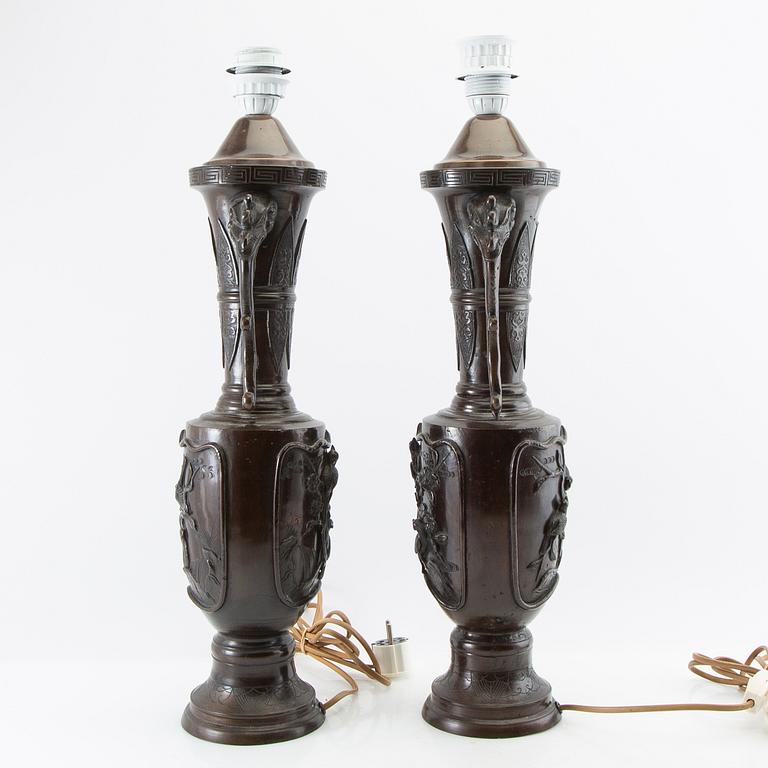 Table lamps a pair China 20th century patinated metal.