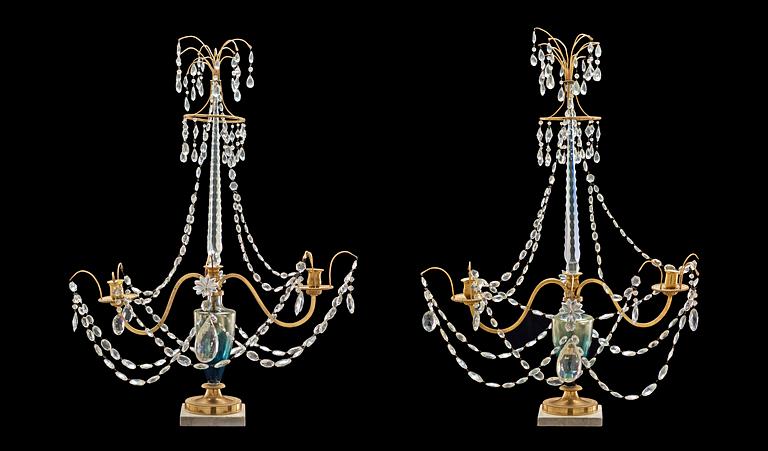 A pair of gilt bronze and glass two-light girandoles, Russia 18th/19th century.