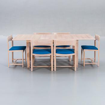 A Danish 1960s dining table and 6 chairs,