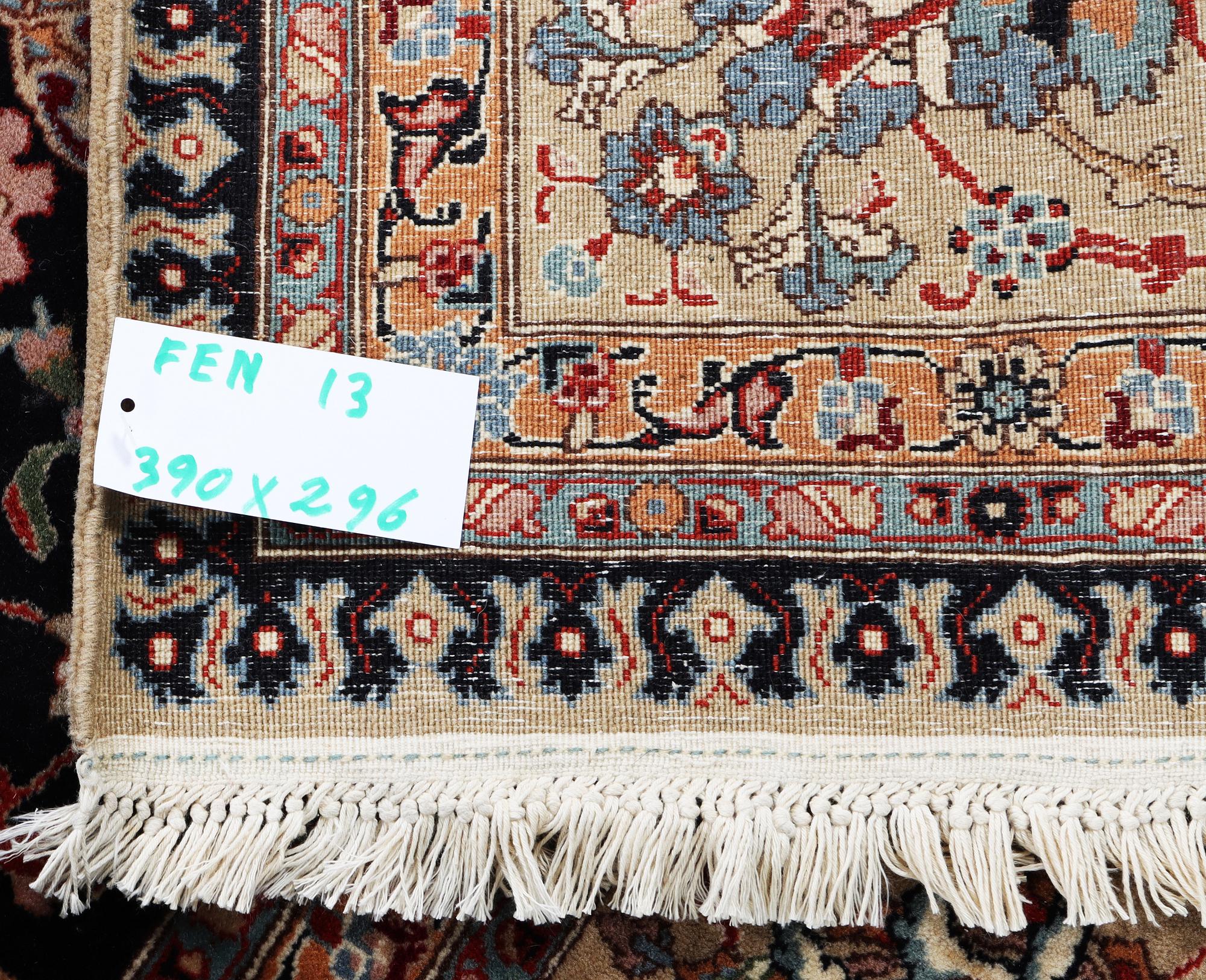 A semi.antique Tabriz carpet, 50 raj, c. 390 x 290 cm.