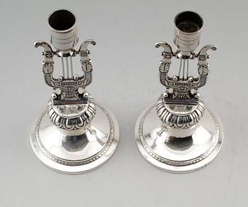 LJUSSTAKAR, 1 par, silver, Anders Lundqvist, Stockholm 1817 och 1829. Vikt ca 344 g.
