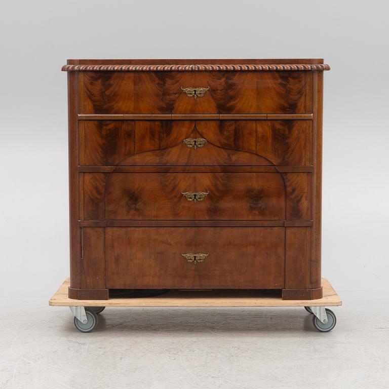 A late Empire chest of drawers, second half of the 19th Century.