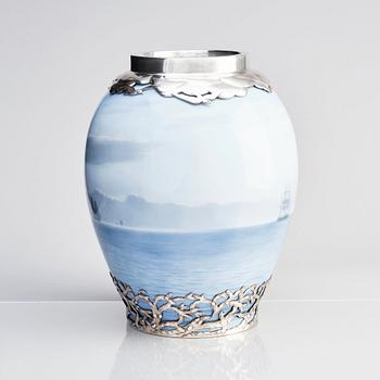 Anton Michelsen, & Royal Copenhagen, a porcelain vase, model 1634, base and mouth of sterling silver, Copenhagen 1914.